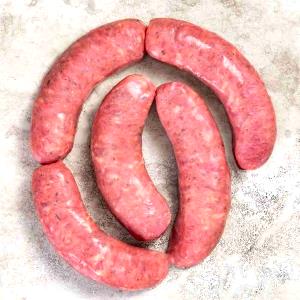 Quantas calorias em 1/2 unidade (50 g) Linguiça Toscana com Especiarias?