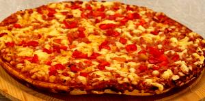 Quantas calorias em 1/4 pizza (98 g) Pizza Grandiosa Alemanha?