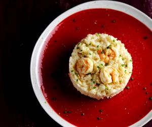 Quantas calorias em 1 Dose Risoto De Camarão E Leite De Coco?