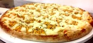 Quantas calorias em 1 fatia (107 g) Frango C/ Requeijão Artezanale Pizza (Média)?