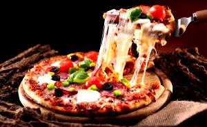 Quantas calorias em 1 fatia (40 g) Pizza Toscana?