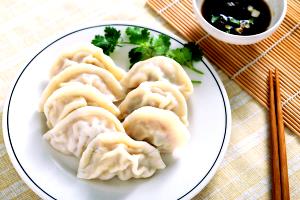 Quantas calorias em 1 Grande Bolinho Dumpling Simples?