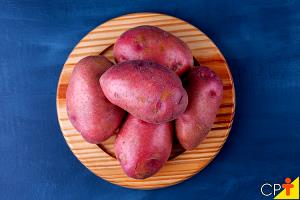 Quantas calorias em 1 İnteiro, Pequeno (85,0 G) Batata rosa, assada?