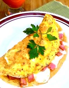 Quantas calorias em 1 Ovo Omelete ou Ovos Mexidos com Queijo e Presunto ou Bacon?