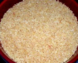 Quantas calorias em 1 Oz Bulgur (Cozido)?