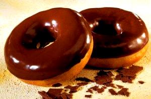 Quantas calorias em 1 Oz Donuts de Chocolate com Açucar?