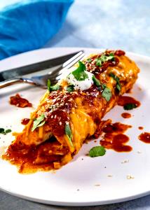 Quantas calorias em 1 Oz Enchilada com Carne de Vaca e Queijo?