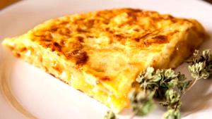 Quantas calorias em 1 Oz Frittata de Batata?