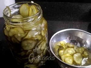 Quantas calorias em 1 Oz Picles de Pepino Doce?