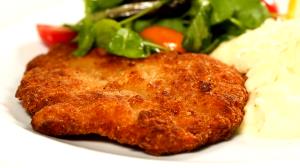 Quantas calorias em 1 Oz, Sem Ossos Schnitzel de Vitela?