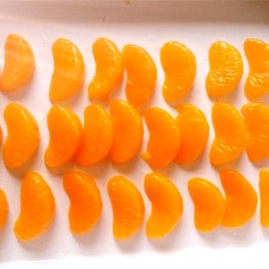 Quantas calorias em 1 Oz Tangerinas (em Calda Light, Enlatado)?