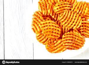 Quantas calorias em 1 Pedido De Fritos De Waffle Batatas Fritas?