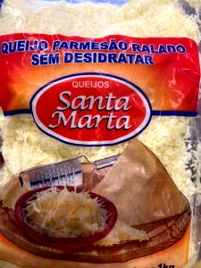 Quantas calorias em 1 porção (10 g) Queijo Parmesão Ralado sem Desidratar?