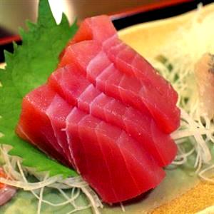 Quantas calorias em 1 porção (100 g) Sashimi Atum (5 Fatias)?