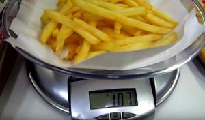 Quantas calorias em 1 porção (102 g) McFritas (Média)?