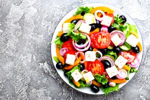 Quantas calorias em 1 Porção (105 G) Salada Grega?