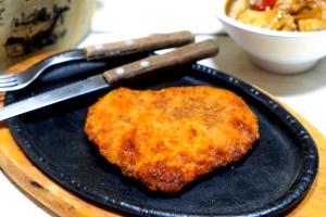 Quantas calorias em 1 porção (130 g) Filé a Milanesa?