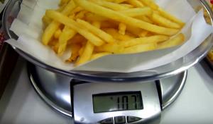Quantas calorias em 1 porção (146 g) McFritas (Grande)?