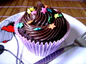 Quantas calorias em 1 Porção (46 G) Cupcake de Chocolate?