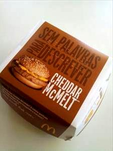 Quantas calorias em 1 porção (484 g) Cheddar McMelt?