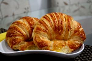 Quantas calorias em 1 Porção (56 G) Croissant?