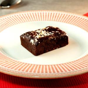 Quantas calorias em 1 porção (60 g) Brownie Belga 70%?
