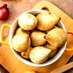 Quantas calorias em 1 porção (85 g) Coxinha de Batata Doce?