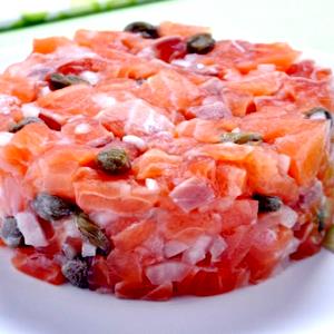 Quantas calorias em 1 porção (85 g) Tartar de Salmão?