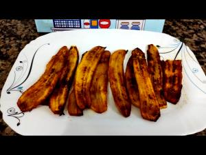 Quantas calorias em 1 Porção Banana da terra frita na manteiga?