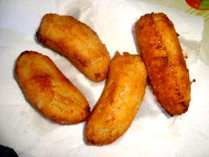 Quantas calorias em 1 Porção Banana nanica à milanesa?