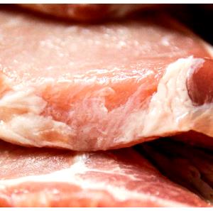 Quantas calorias em 1 Porção Carne porco crua?