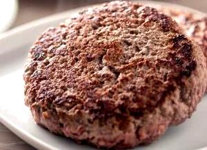 Quantas calorias em 1 Porção Hambúrguer bovino grelhado?