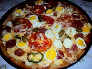 Quantas calorias em 1 Porção Pizza portuguesa?