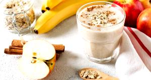 Quantas calorias em 1 Porção Vitamina leite de vaca integral com banana e aveia com açúcar?