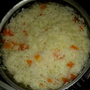 Quantas calorias em 1 Porçoes Arroz Branco Com Cenour E Mandioquinha?