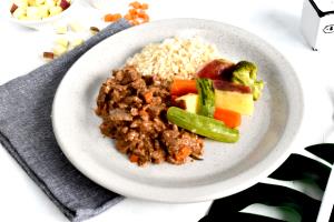 Quantas calorias em 1 Porçoes Arroz Com Carne E Legumes?