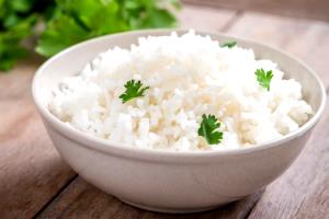 Quantas calorias em 1 Porçoes Arroz Com Molho?