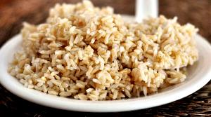 Quantas calorias em 1 Porçoes Arroz Integral Cozido?