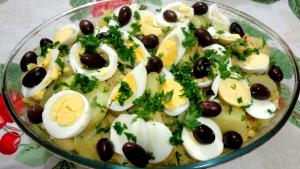 Quantas calorias em 1 Porçoes Bacalhau A Gomes De Sá?