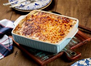 Quantas calorias em 1 Porçoes Bacalhau Gratinado?