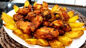 Quantas calorias em 1 Porçoes Batata Cozida Sabor Galinha?