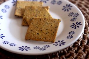 Quantas calorias em 1 Porçoes Biscoito De Grão De Bico E Linhaça?