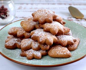 Quantas calorias em 1 Porçoes Biscoito Tradicional De Natal?