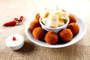 Quantas calorias em 1 Porçoes Bolinho Bom?