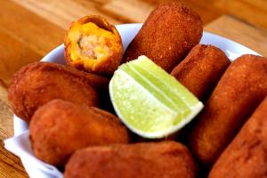 Quantas calorias em 1 Porçoes Bolinho De Abóbora Com Camarão?