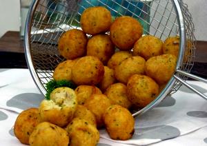 Quantas calorias em 1 Porçoes Bolinho De Bacalhau Ao Forno?