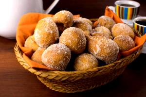 Quantas calorias em 1 Porçoes Bolinho De Leite Em Pó?