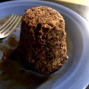 Quantas calorias em 1 Porçoes Bolo De Caneca Com Ovo, Cacau E Banana?