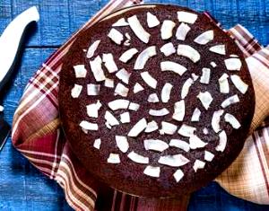 Quantas calorias em 1 Porçoes Bolo De Chocolate Com Coco Low Carb?