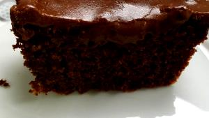 Quantas calorias em 1 Porçoes Bolo De Chocolate Low Carb Com Farinha De Amêndoas?